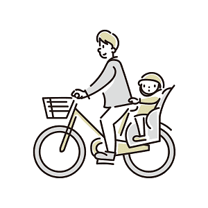 一緒に自転車に乗る親子